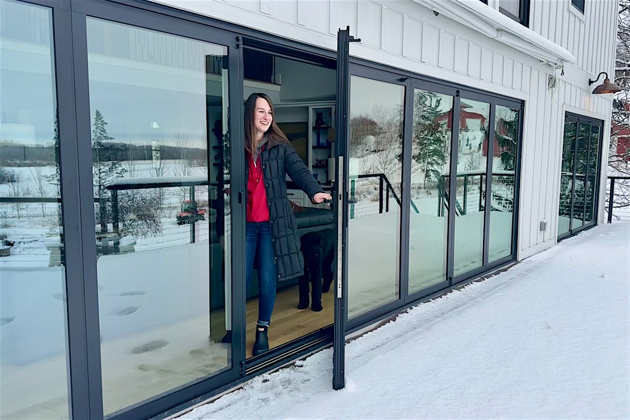 aluminum opening glass doors in snow