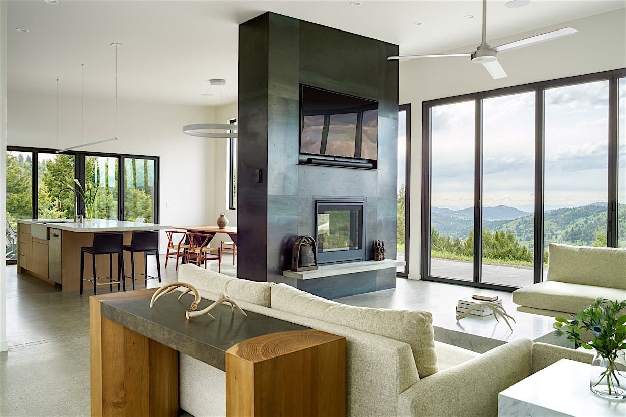 NanaWall folding glass walls open to Montana landscape