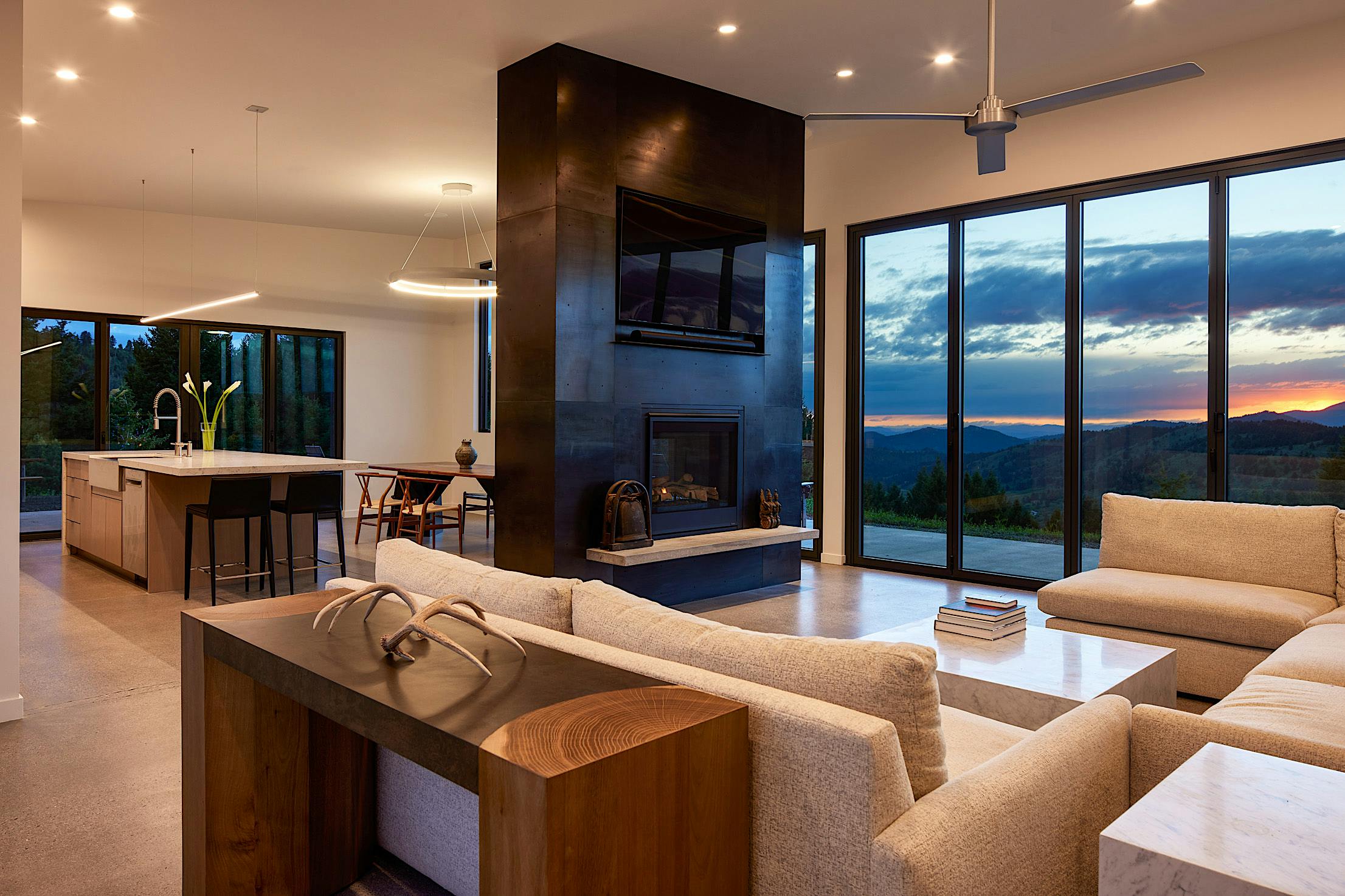 Montana sunset through folding glass walls