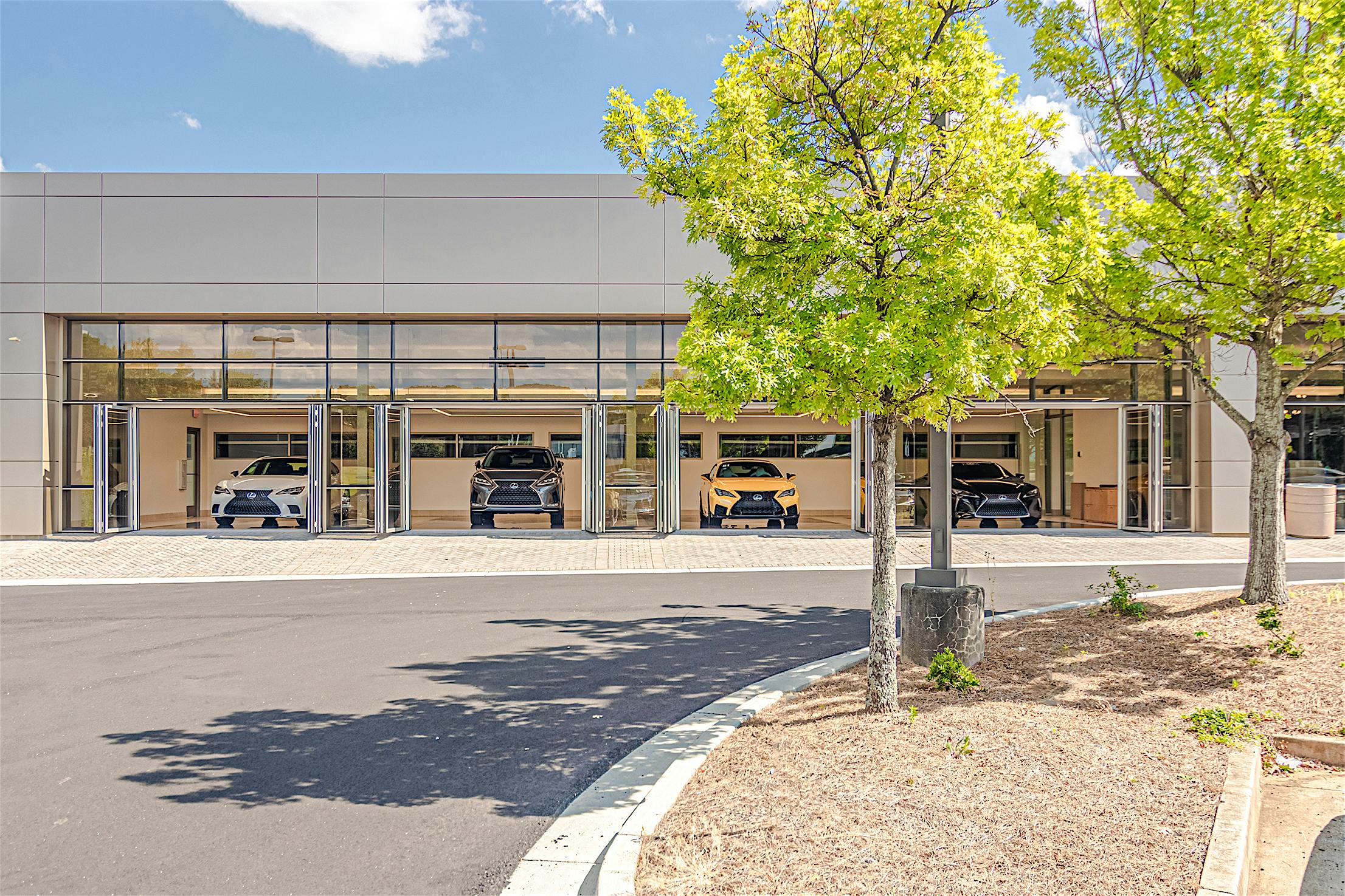 Lexus auto showroom with NanaWall commercial folding glass doors