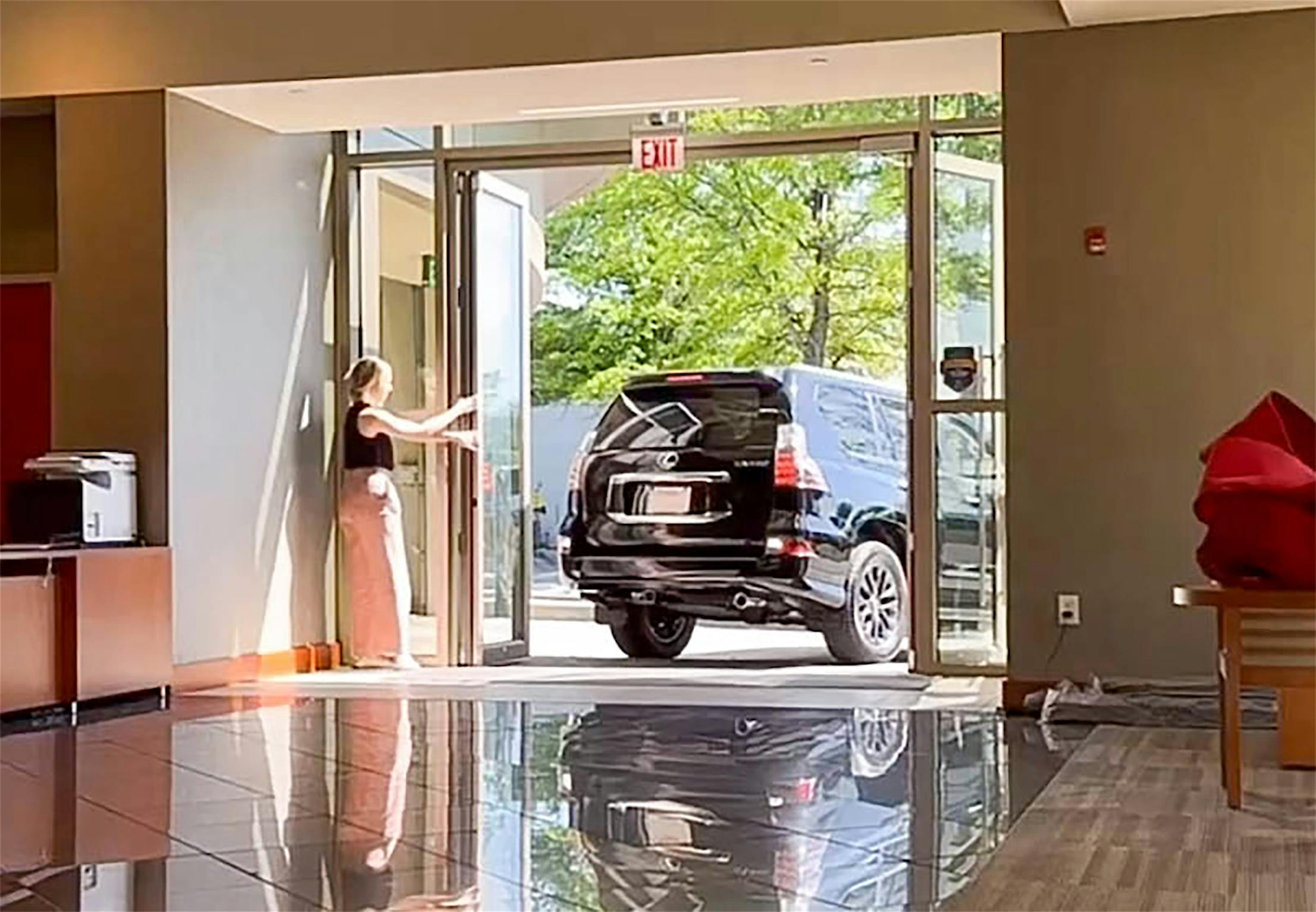 Car rotation with commercial opening glass door