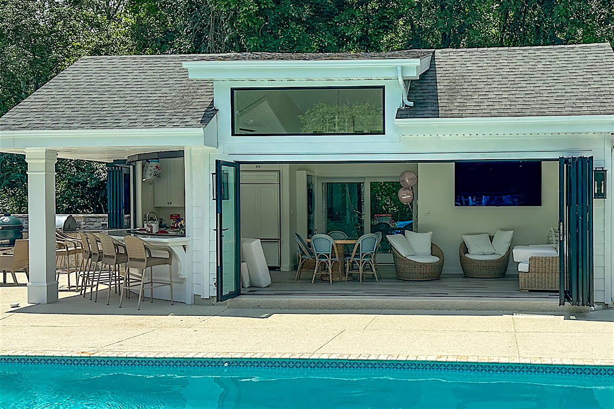 pool house designe with folding and sliding opening glass doors