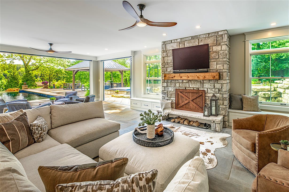four-season room addition with energy-efficient accordion door systems