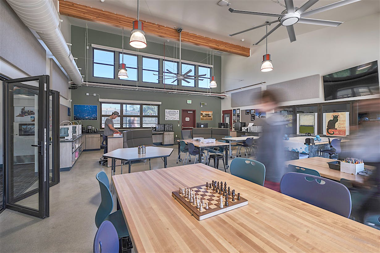 active learning classroom designed with bifold glass walls