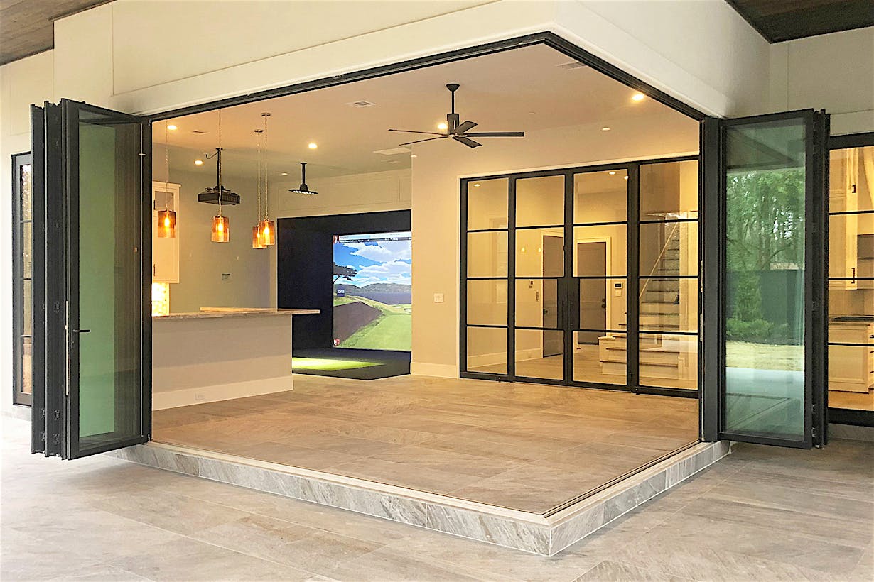 Custom home with residential folding glass door systems