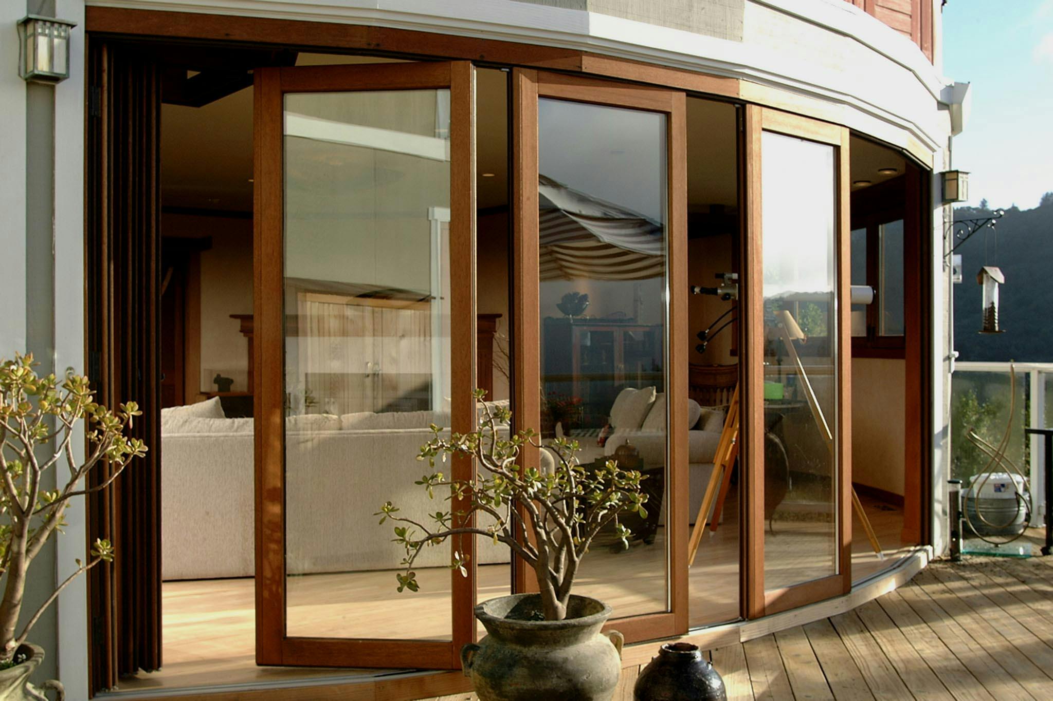 Use Sliding Glass Walls to Separate Indoor/Outdoor Living Spaces