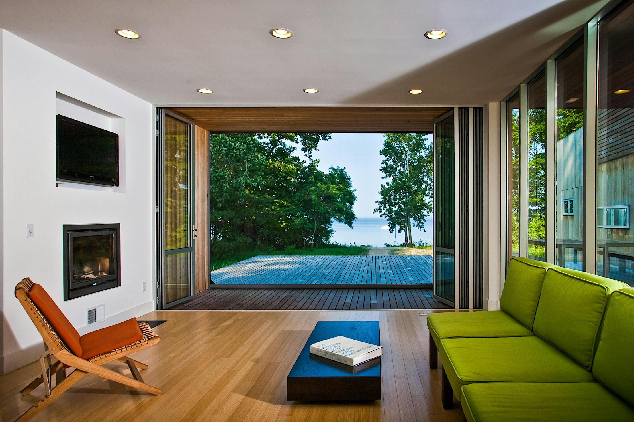 Wide-Open-Folding-Glass-Wall-in-Living-Room