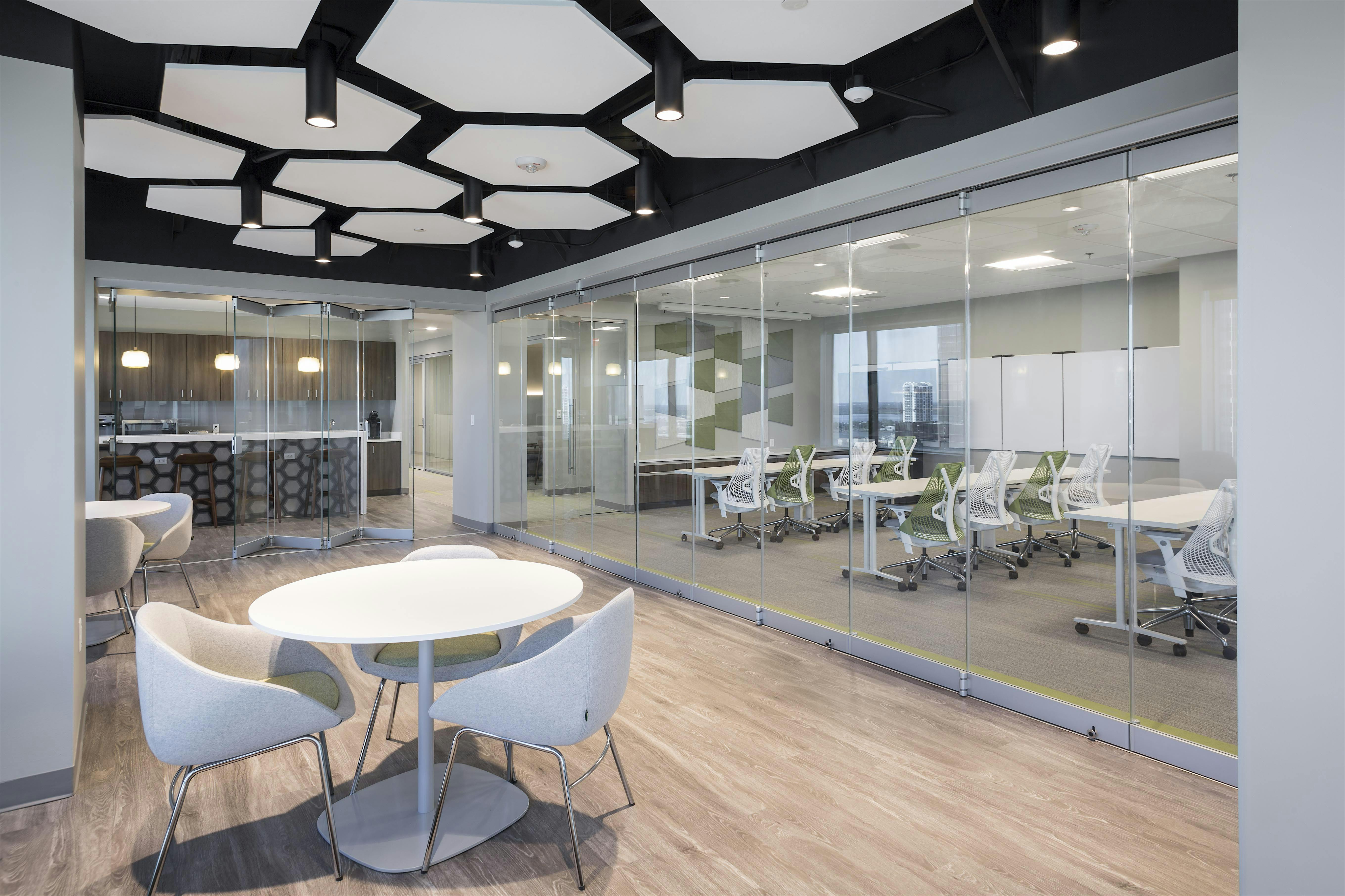 NanaWall Folding glass doors in space-efficient workplace design