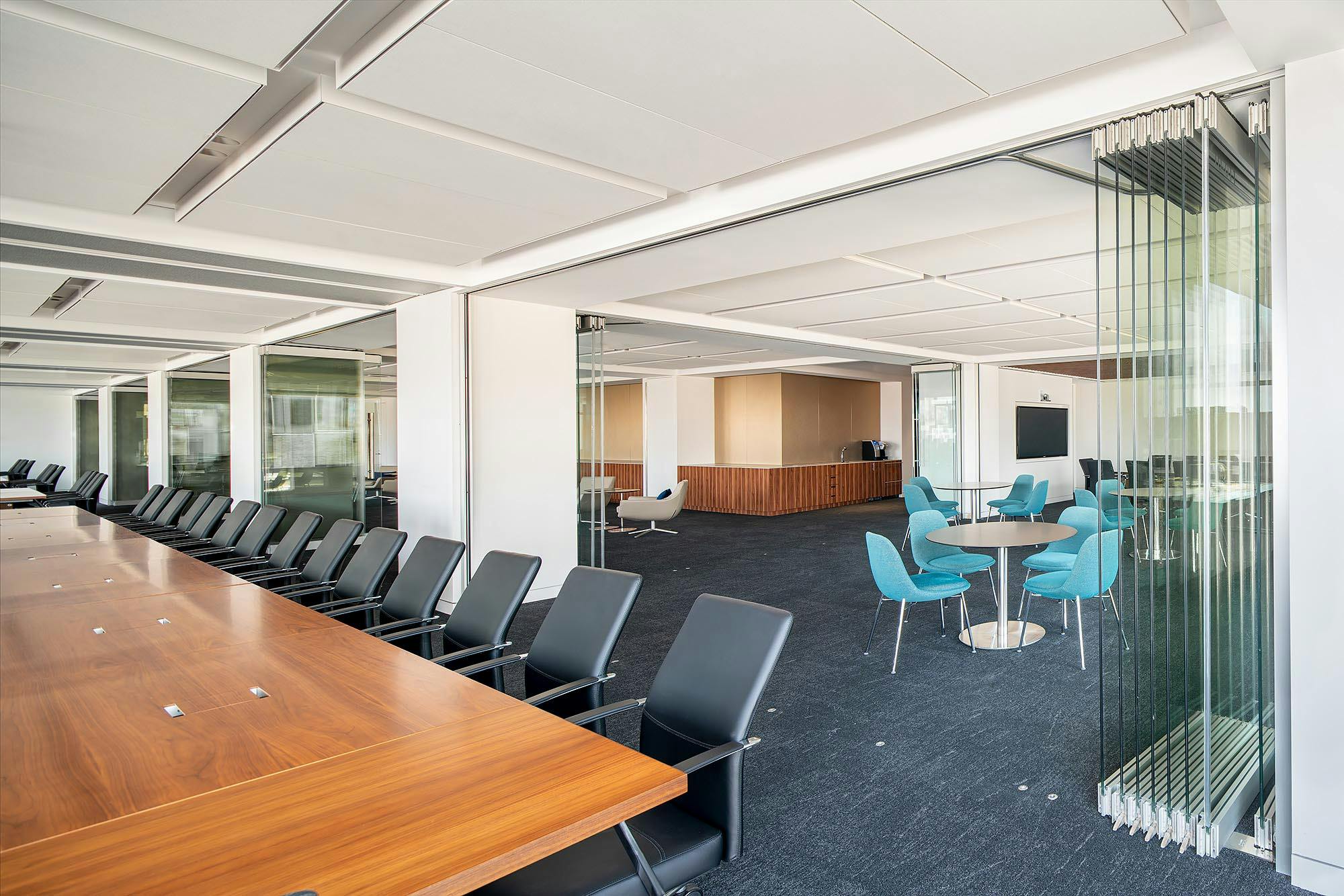 conference-room-with-opening-frameless-glass-walls