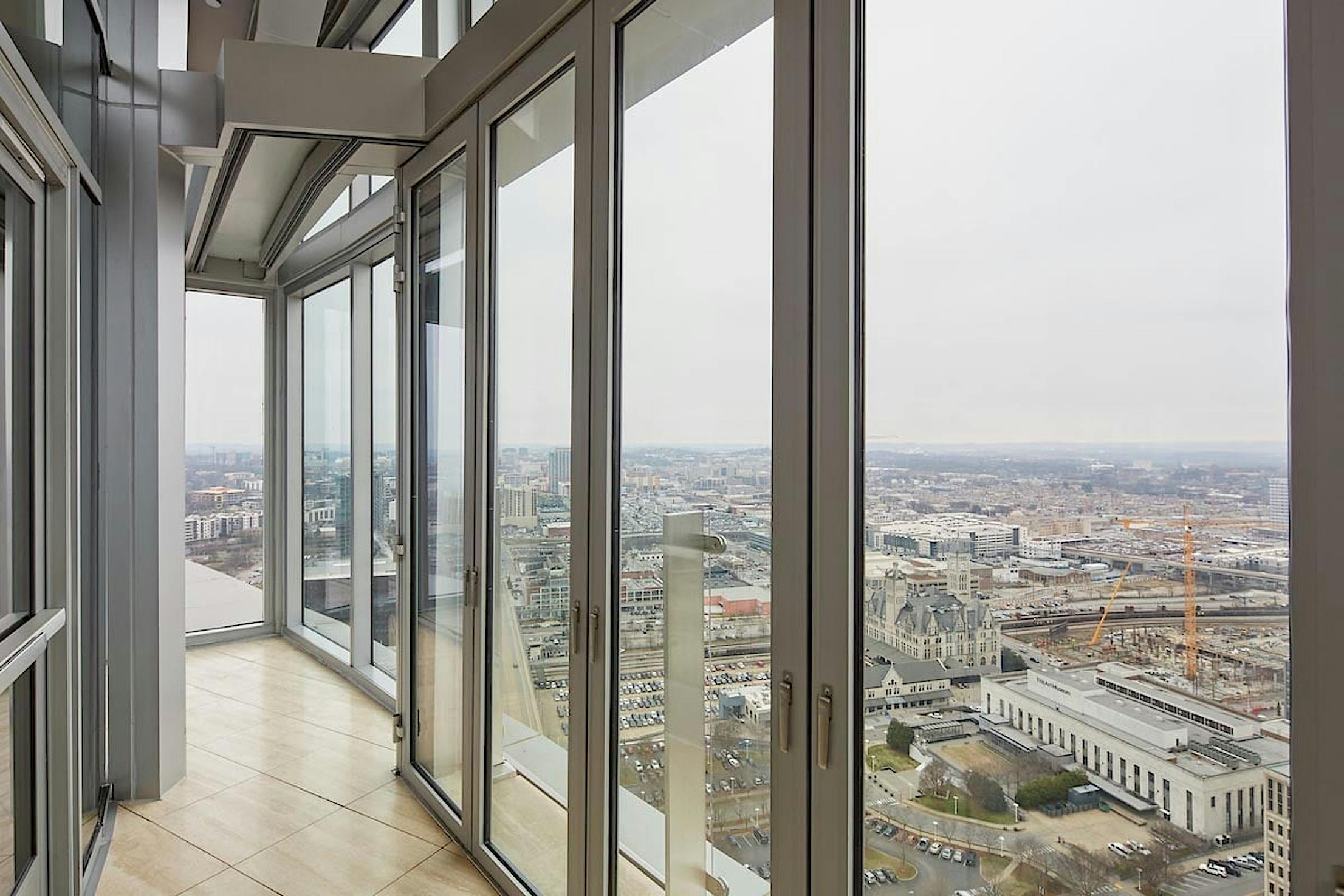 single-track-sliding-glass-system-with-panels-stacking-in-parking-bay