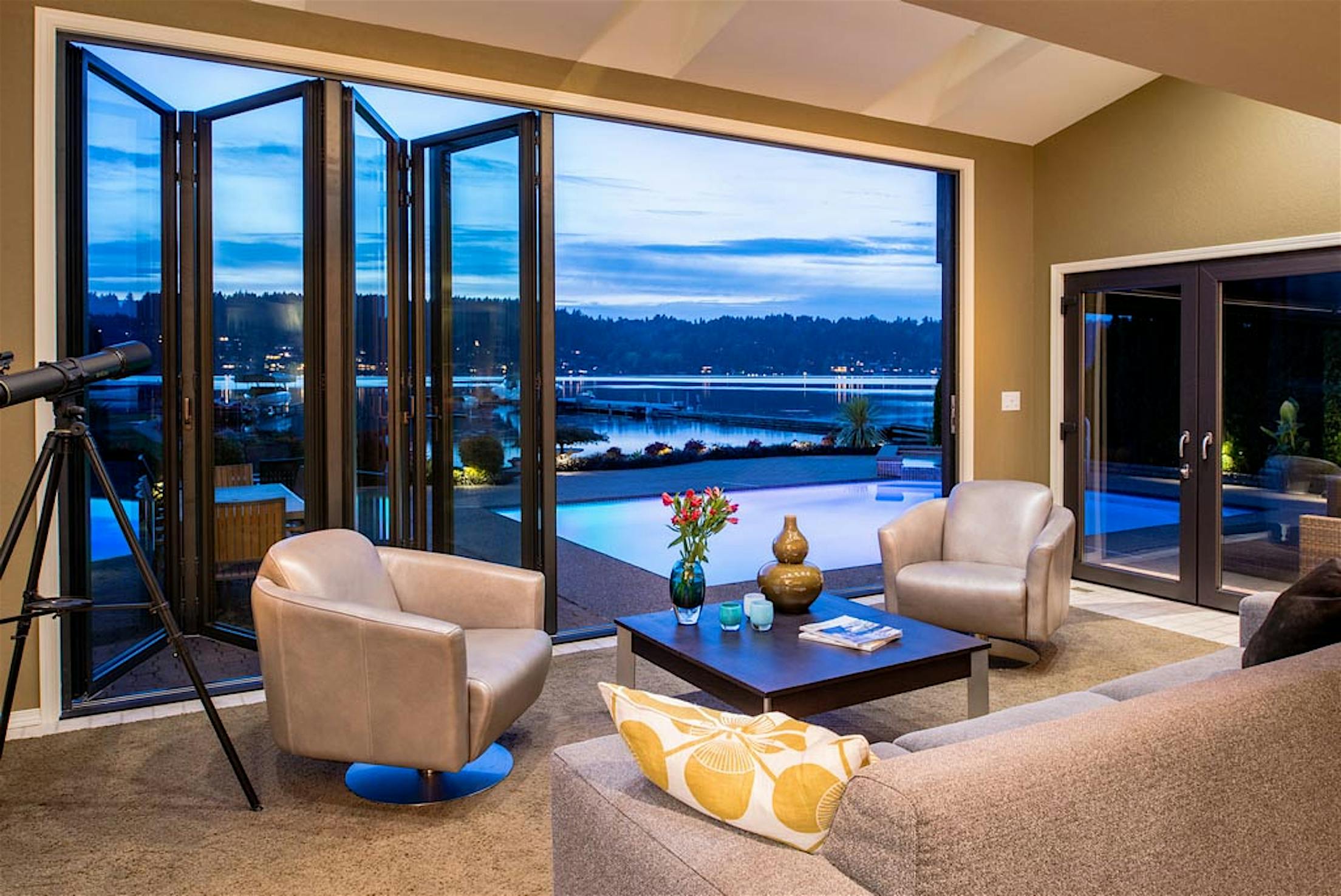 partially-open-folding-glass-wall-in-remodeled-home
