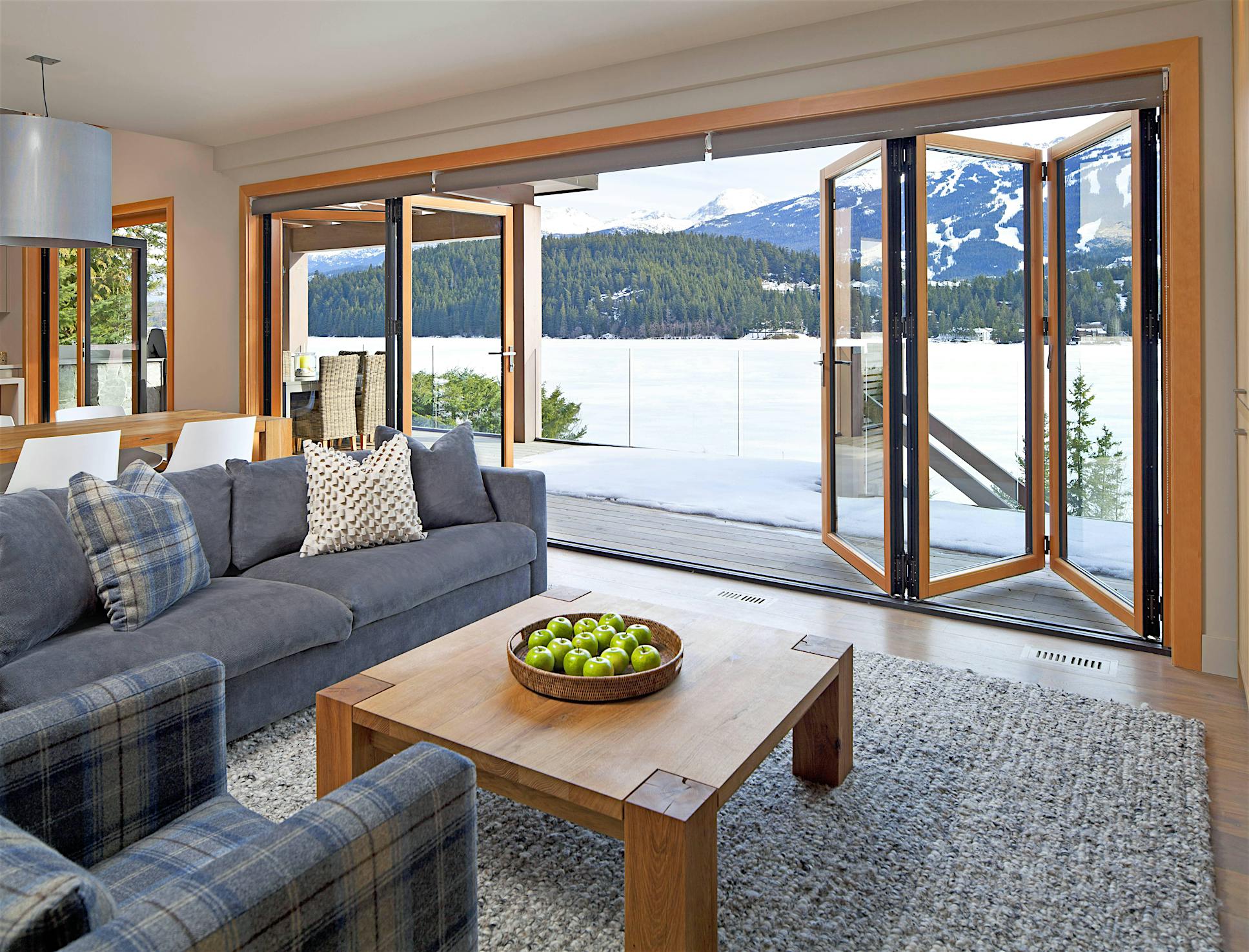 aluminum clad folding glass wall for energy efficiency and durability in snow