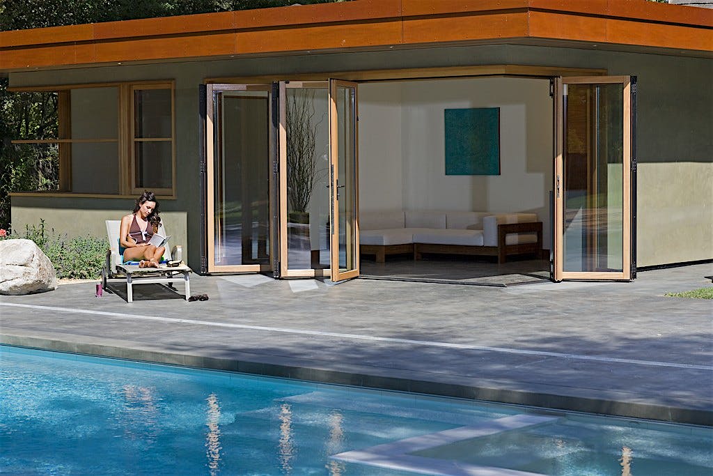 Menlo Park modern pool house with WD66 folding glass wall