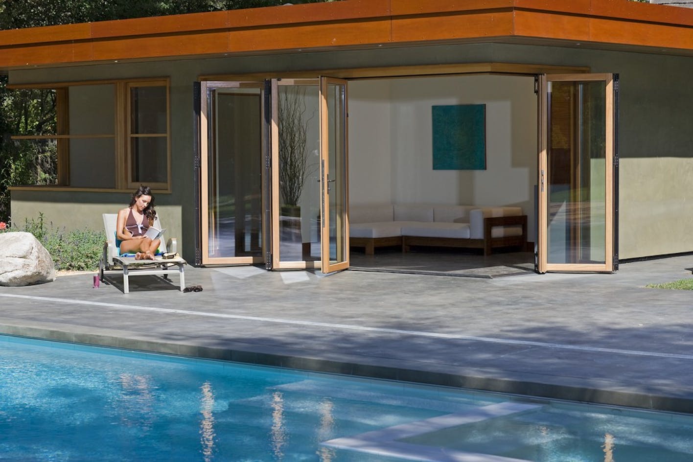 Menlo Park modern pool house with WD66 folding glass wall