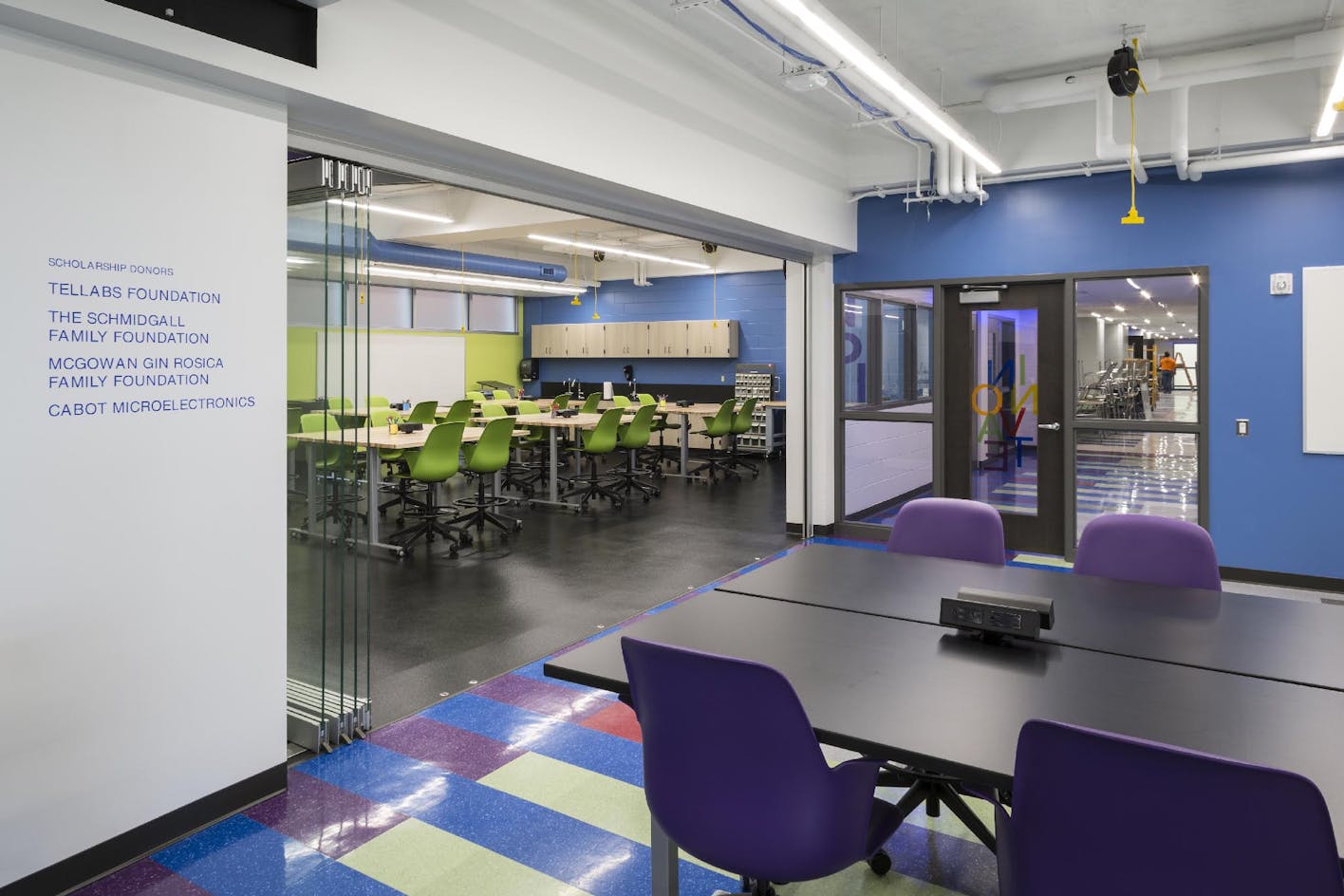 Sound control interior frameless glass wall systems between classrooms