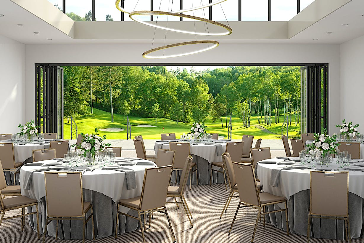 A banquet room with a view of a golf course, featuring commercial glass walls - doors stacked on both sides