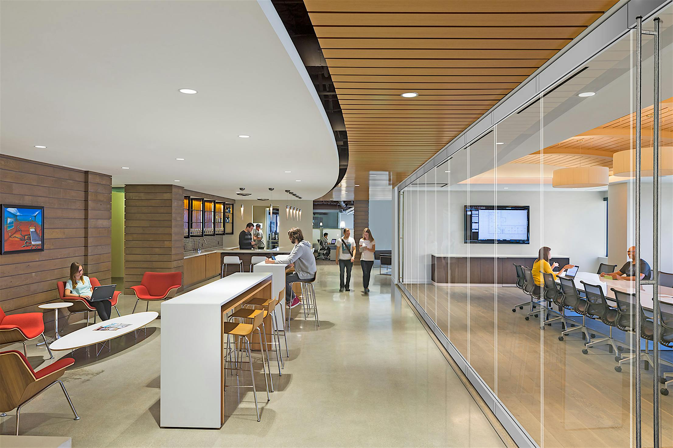 A modern conference room enclosed with acoustical all glass walls - closed exterior