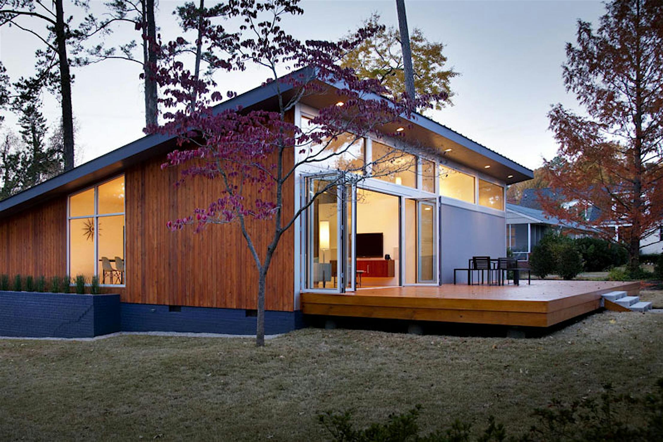 SL70 house with trees and aluminum folding desk doors