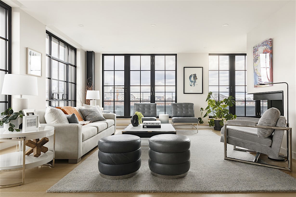 Multifamily living room with a large window - simulated divided lites design