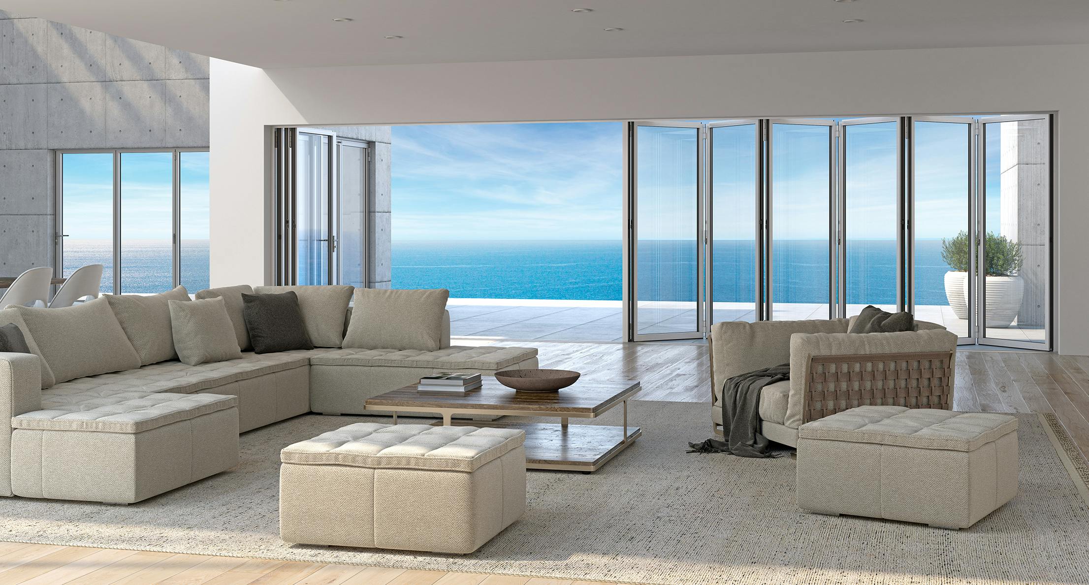 Modern  Living Room with Folding Glass Walls and a View of the Ocean