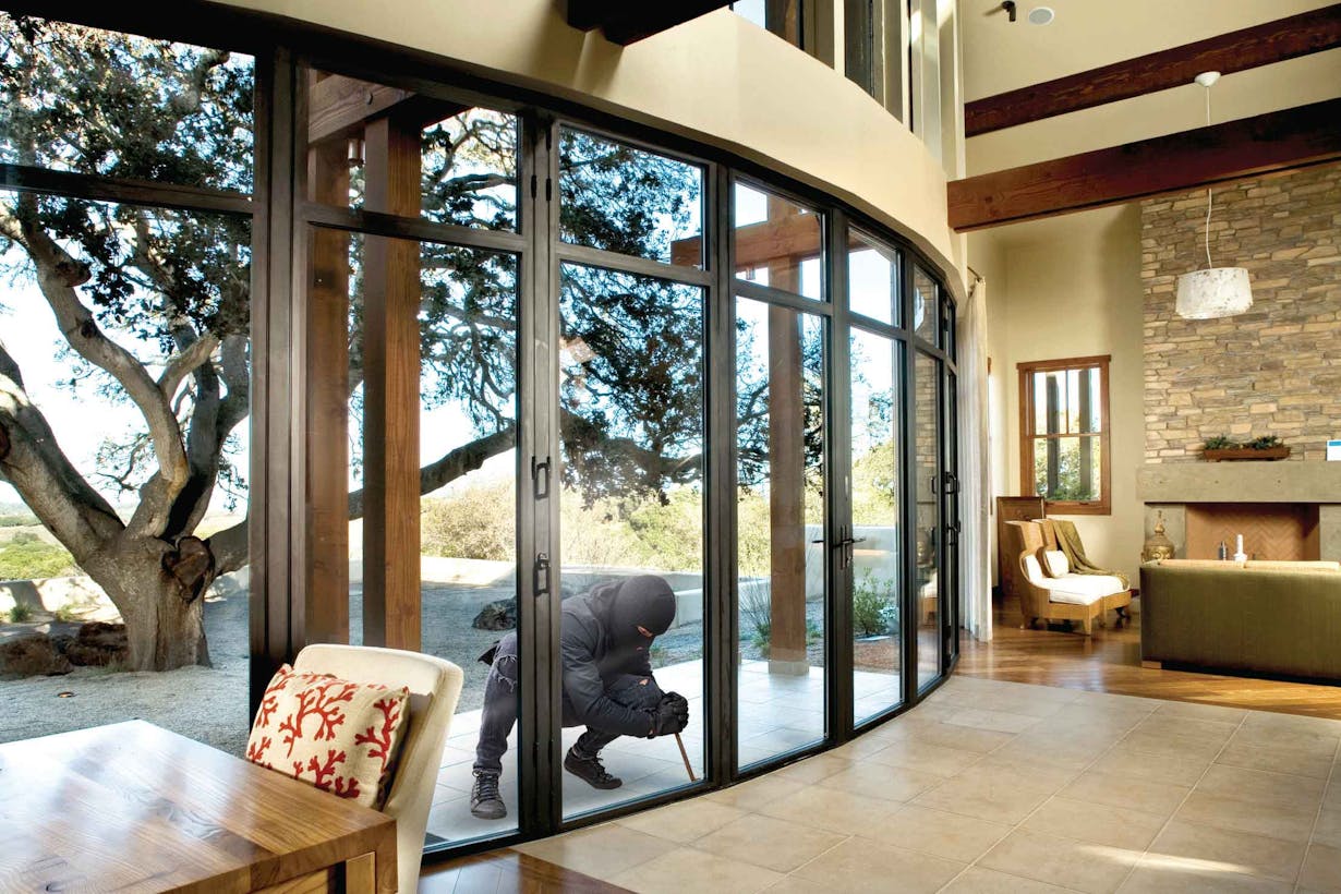 A living room with sliding glass doors and a fireplace