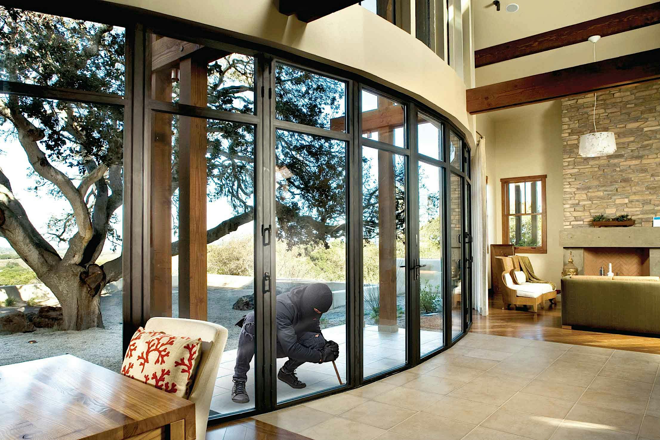 A living room with sliding glass doors and a fireplace