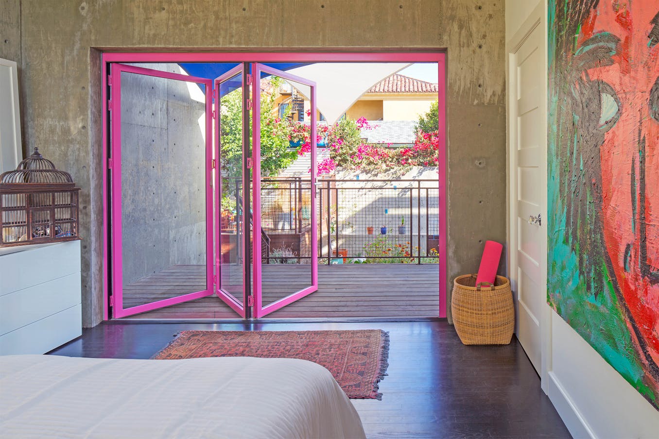 Bedroom with barbie pink glass walls