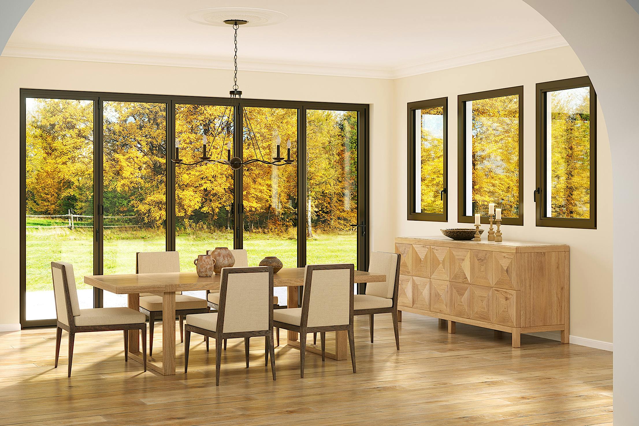 Dining room features large thermal-efficiency tilt-turn windows showcase the vibrant autumn trees outside.