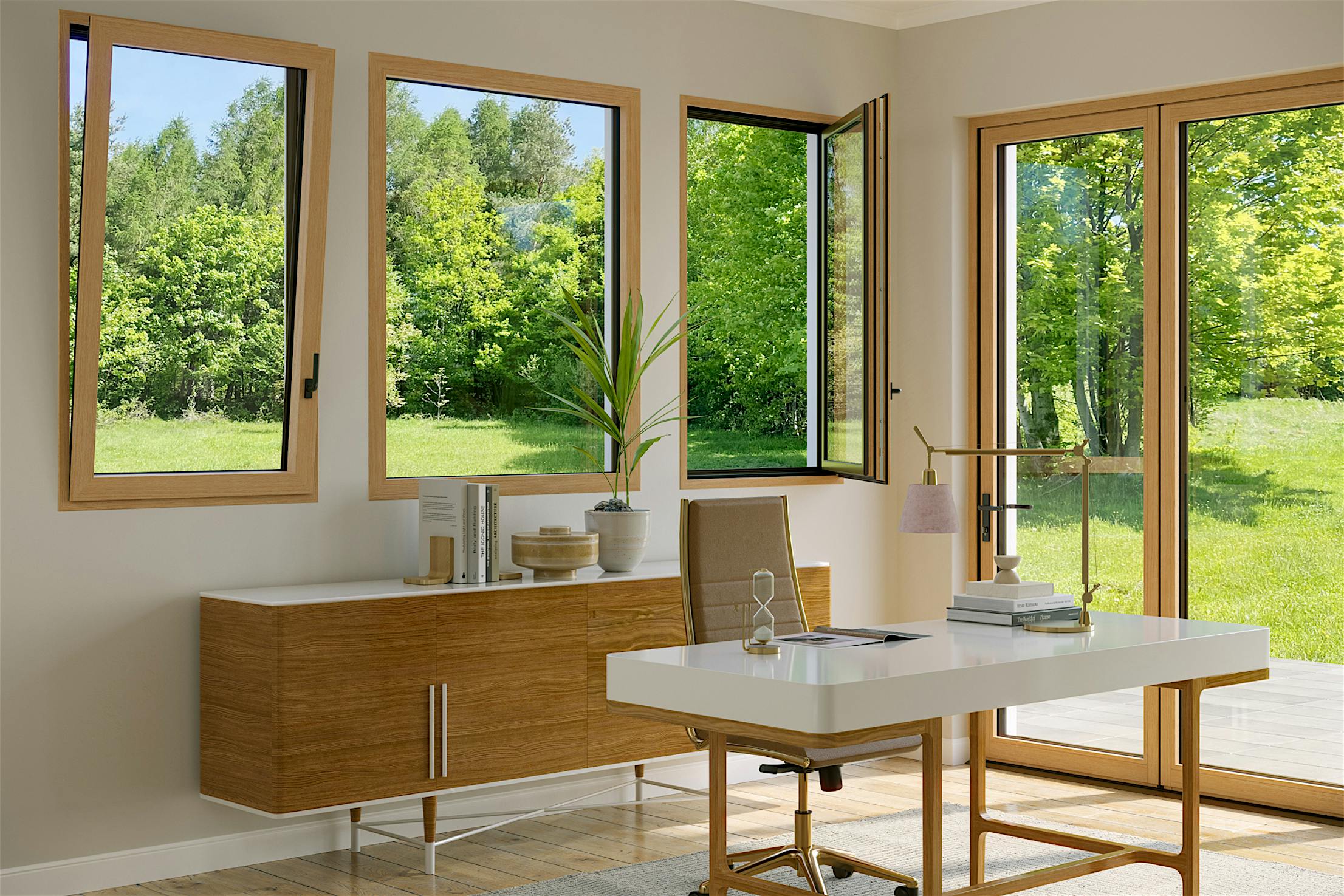 An office with a wooden table features Generation 4 folding glass walls and tilt turn windows, offering a uniform aesthetic and framing views of trees with yellow autumn leaves outside.