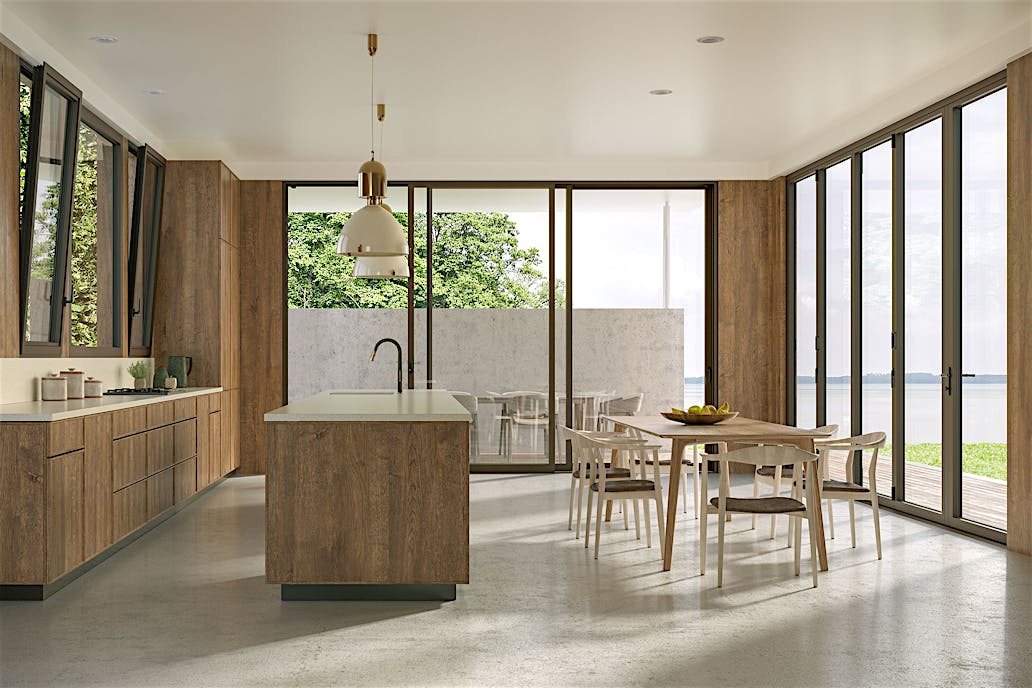 Generation 4 Comprehensive Product Line | Modern kitchen with wooden cabinets, island, and dining area has large sliding, folding glass doors, tilt turn windows offering views of trees and a lake.