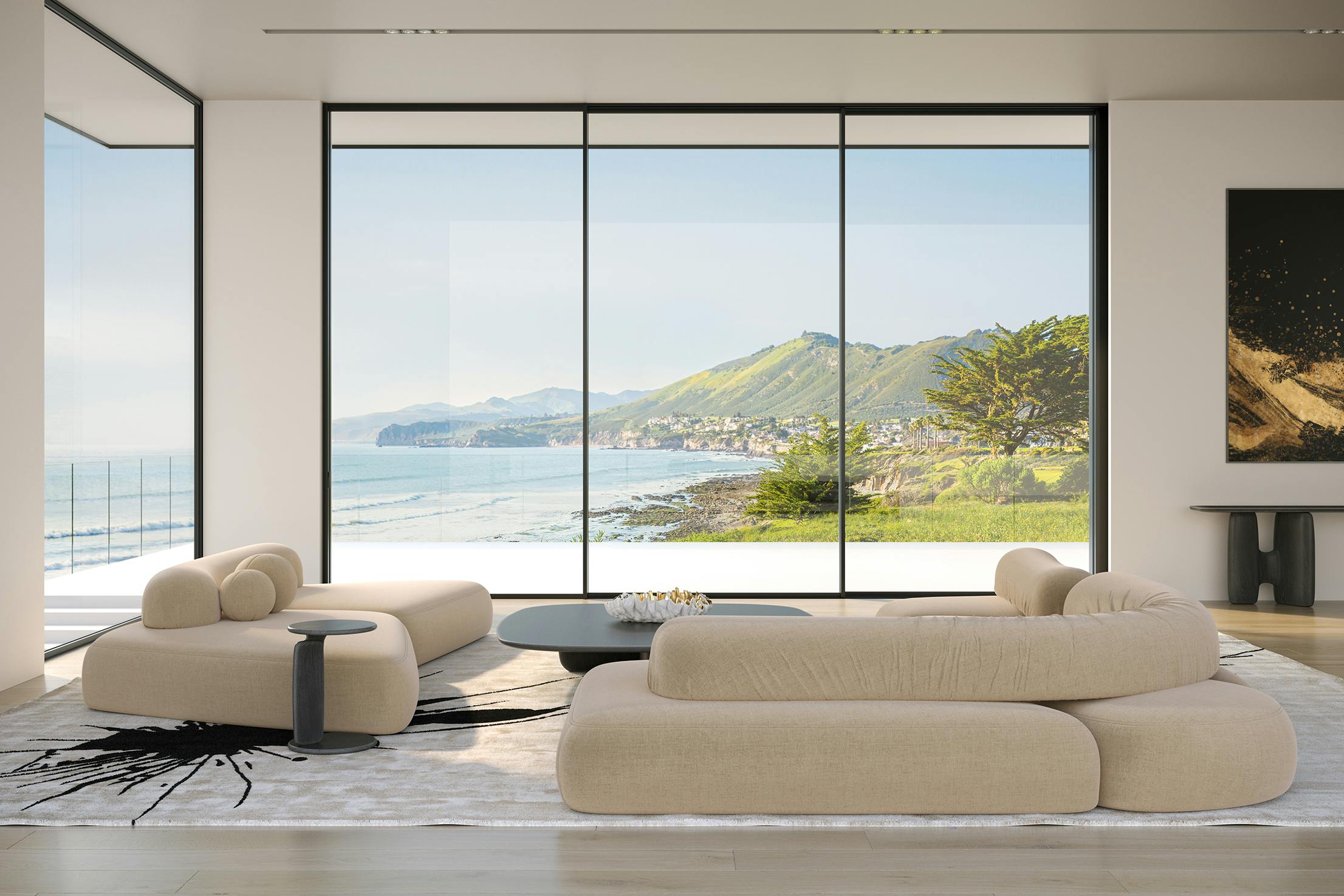 Large panel sliding glass walls offer an uninterrupted view of coastal mountains, lush greenery, and the ocean.