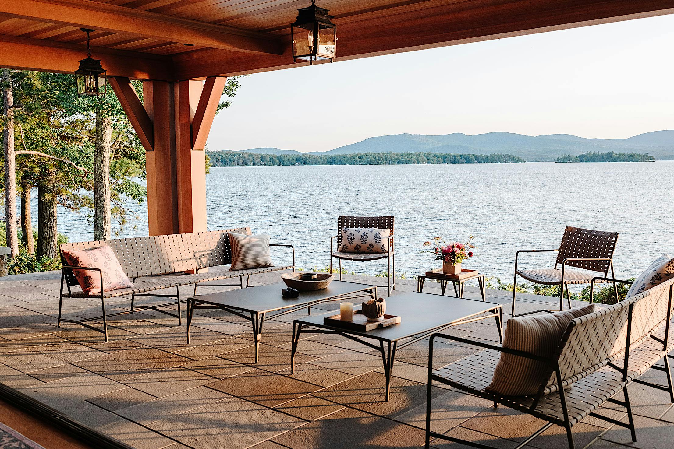 A desk with a view of a lake