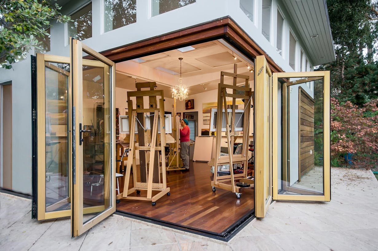 Wood framed open corner folding glass walls