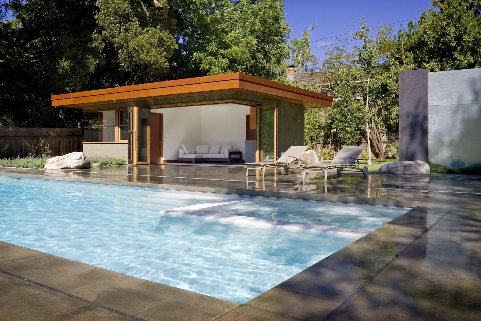 WD65 Residence with a pool and trees _ wood framed glass walls