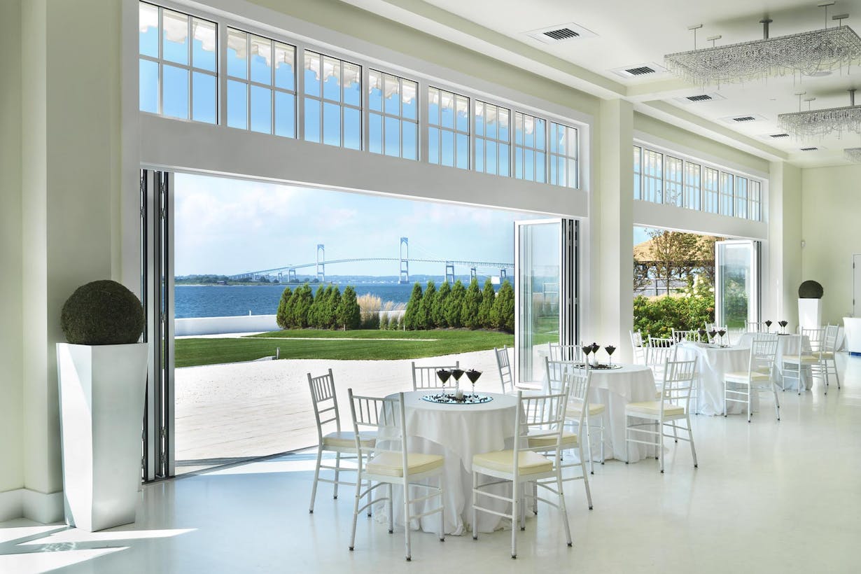 Commercial wedding event terrace with ocean view - folding glass walls