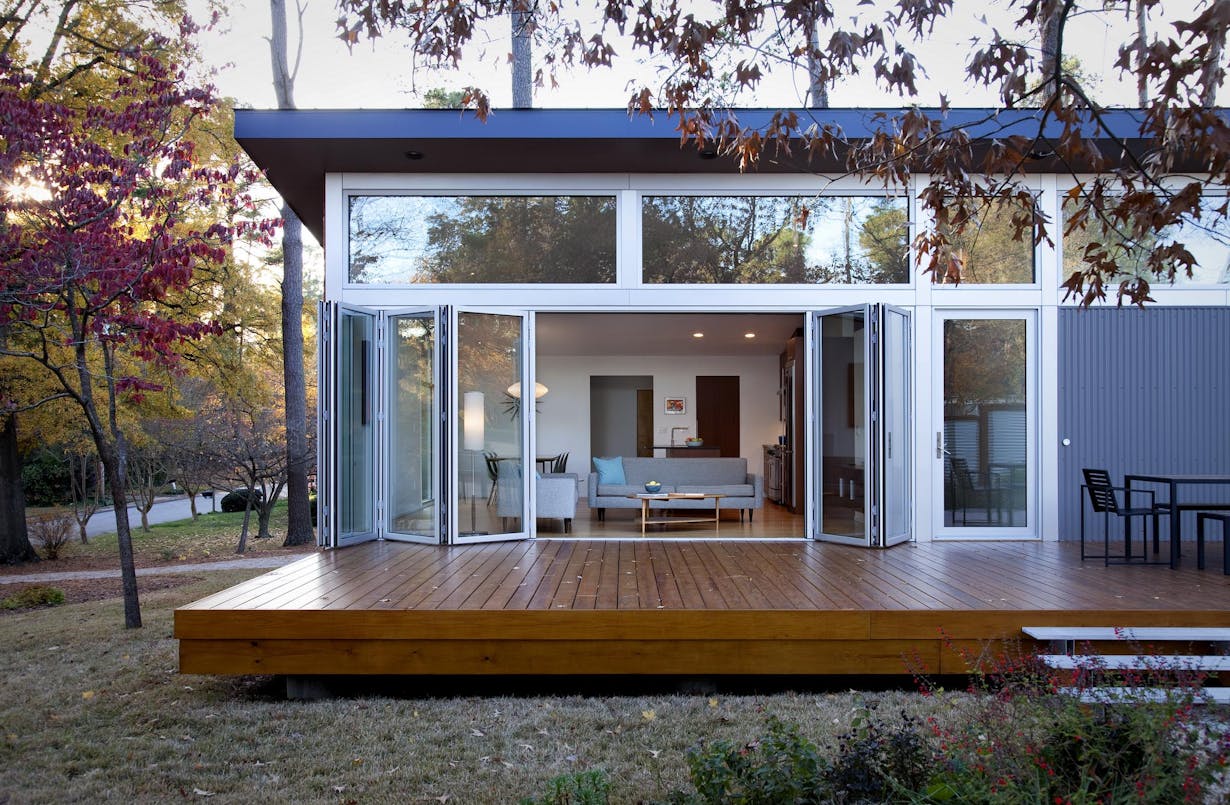The Big Shrink remodel residential project in NC - glass walls systems opening exterior