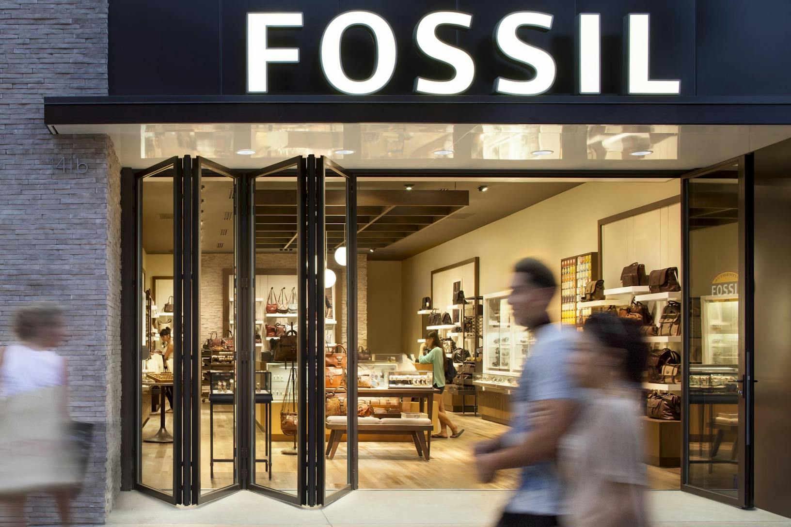 SL70 Retail Folding Entry Doors at the Fossil Store in Santa Monica, CA - Opening Exterior Night View