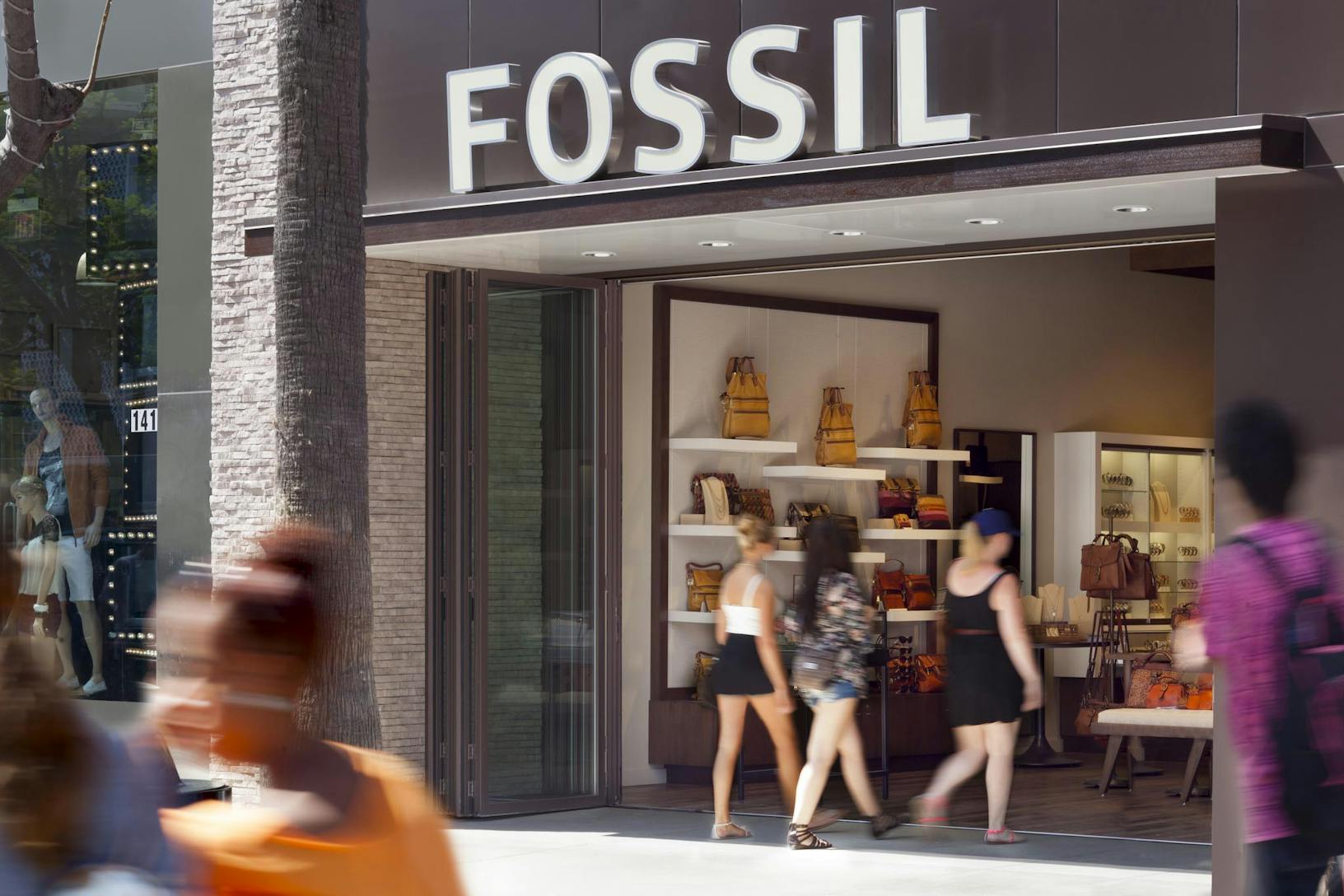 SL70 Retail Folding Entry Doors at the Fossil Store in Santa Monica, CA - Opened Exterior Day View
