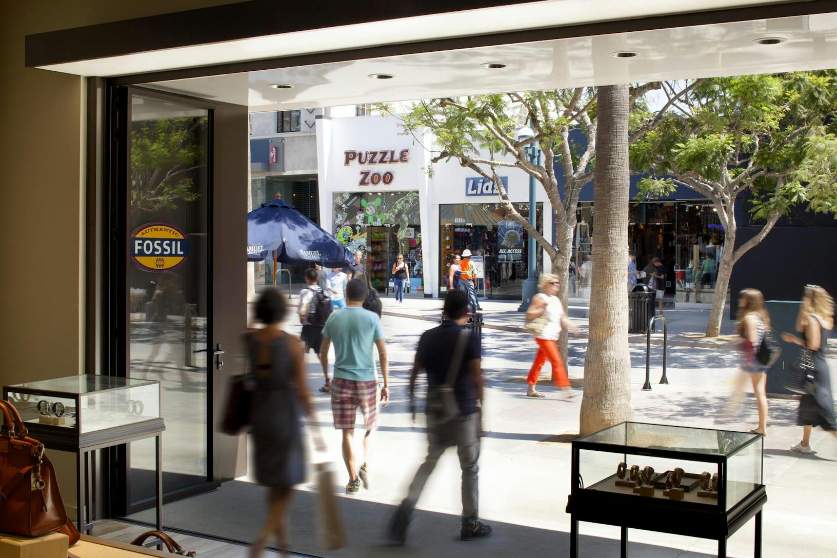 SL70 Retail  Folding Entry Doors at the Fossil Store in Santa Monica, CA - Opened Interior Day View