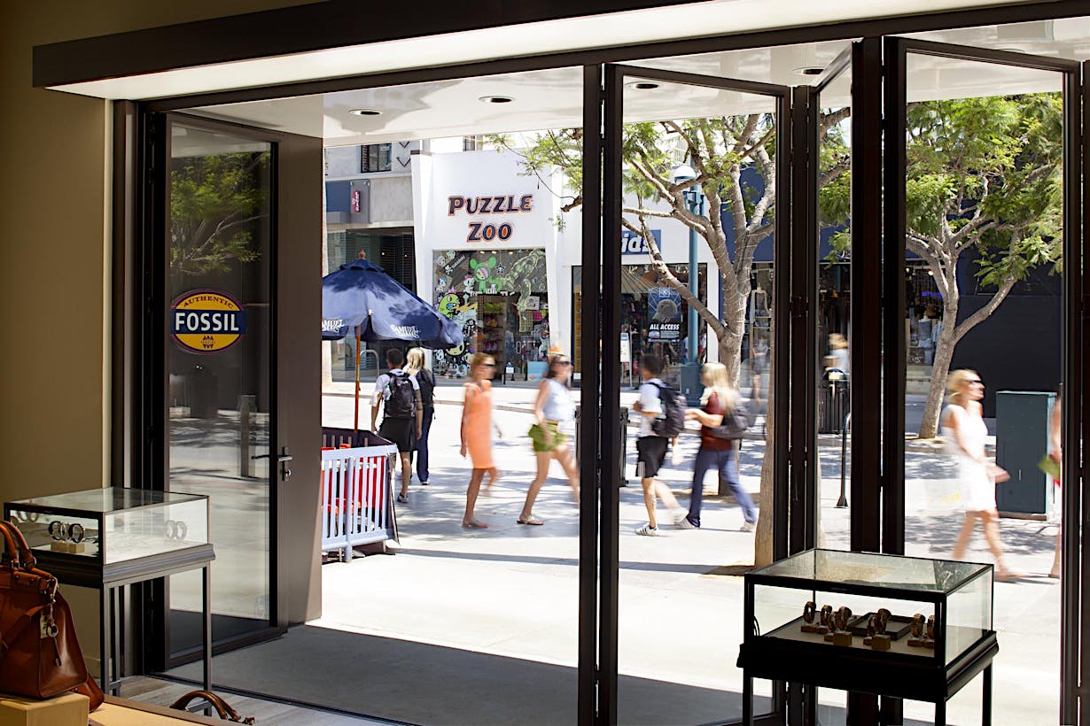 SL70 Retail Folding Entry Doors at the Fossil Store in Santa Monica, CA - Opening Interior Day View