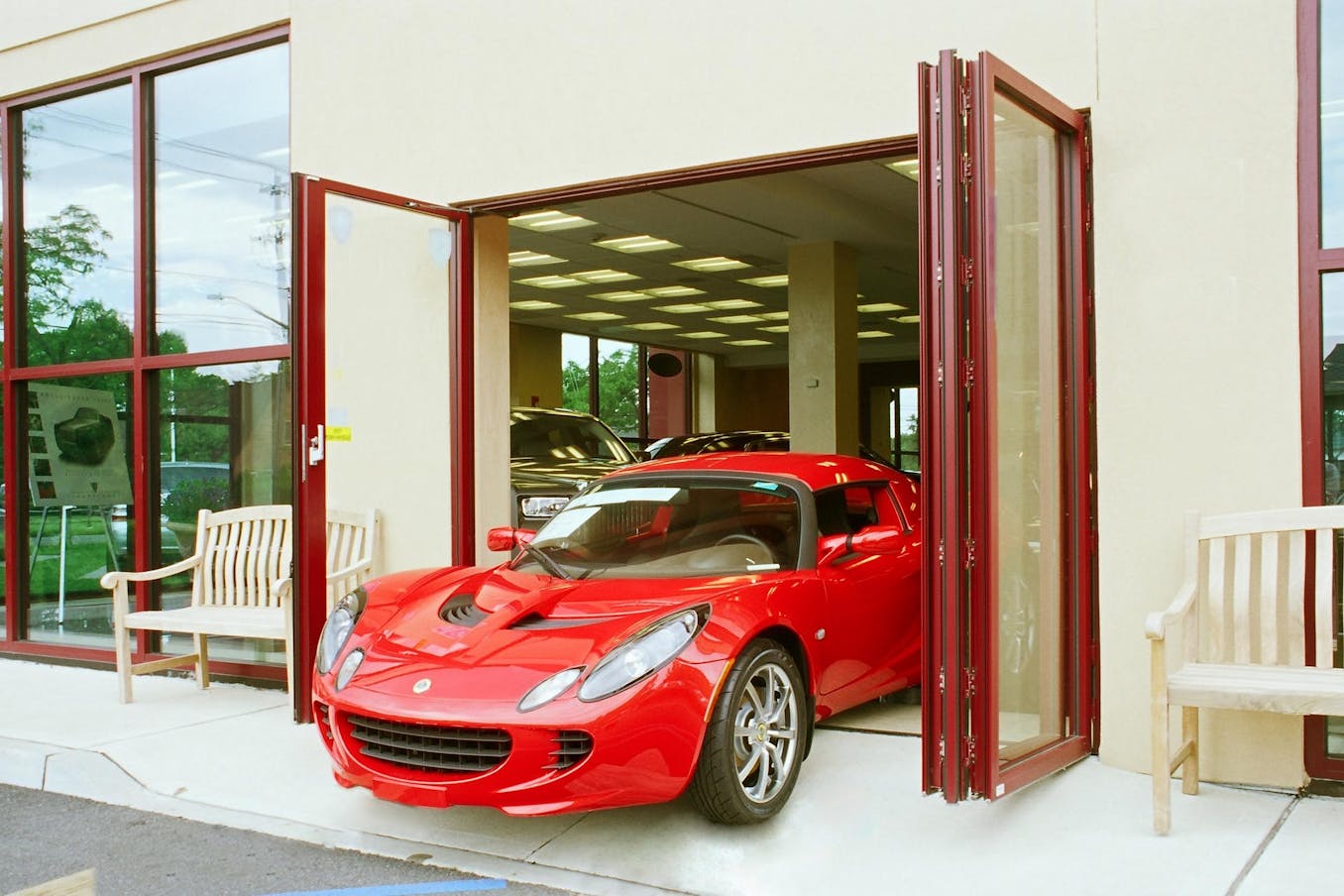 Commercial Storefront Folding Glass Doors at Manhattan Motors, NY - Opening Exterior 