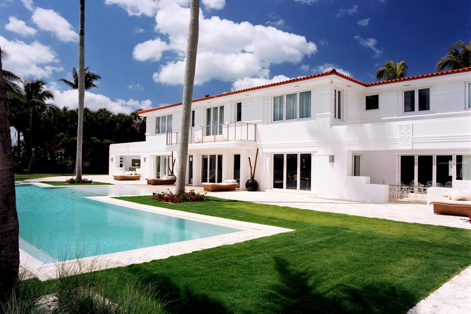 SL73 Large white house with pool exterior - Extreme weather resistance glass walls