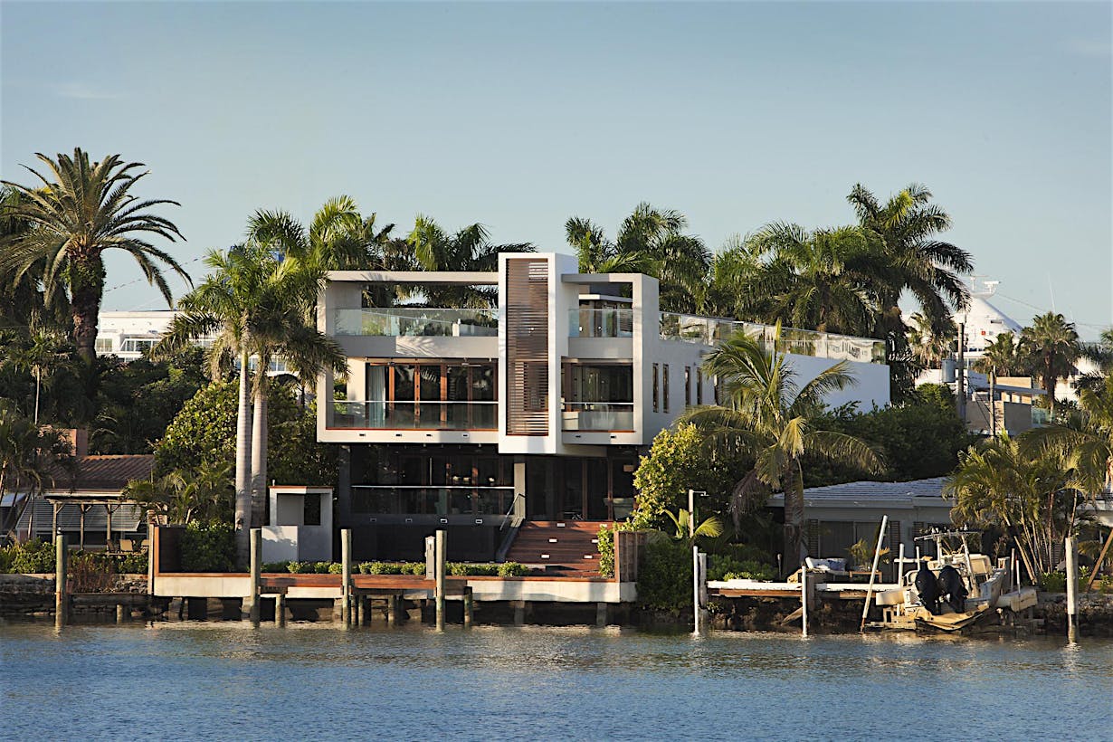 Ocean front house with impact-resistant glass walls