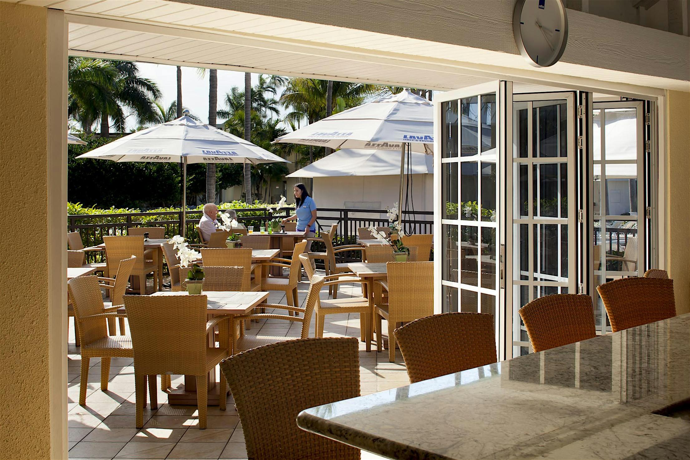 Hyatt Pier 66 FL dining area with divided lites folding doors