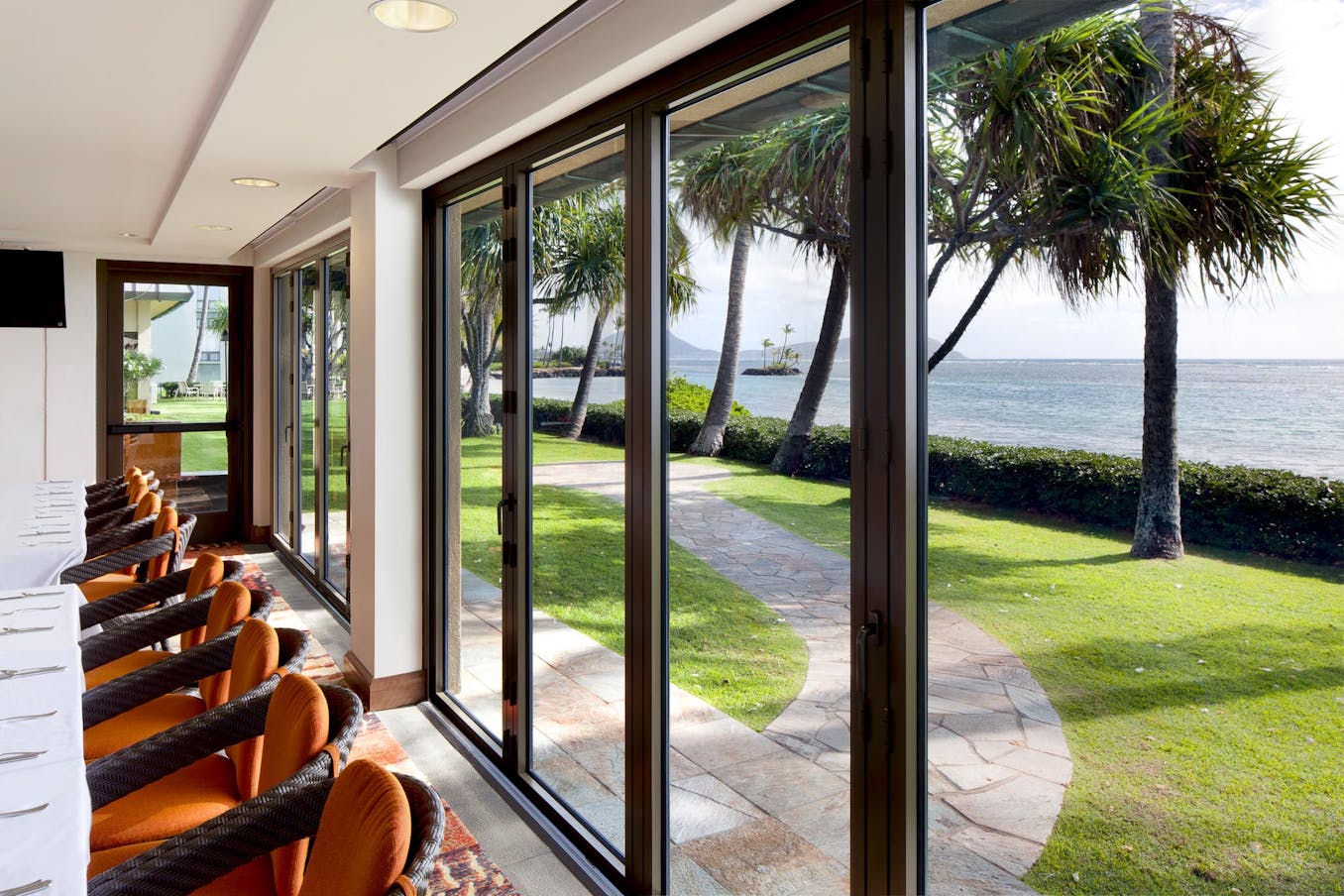 Country club dining area with a view of the ocean