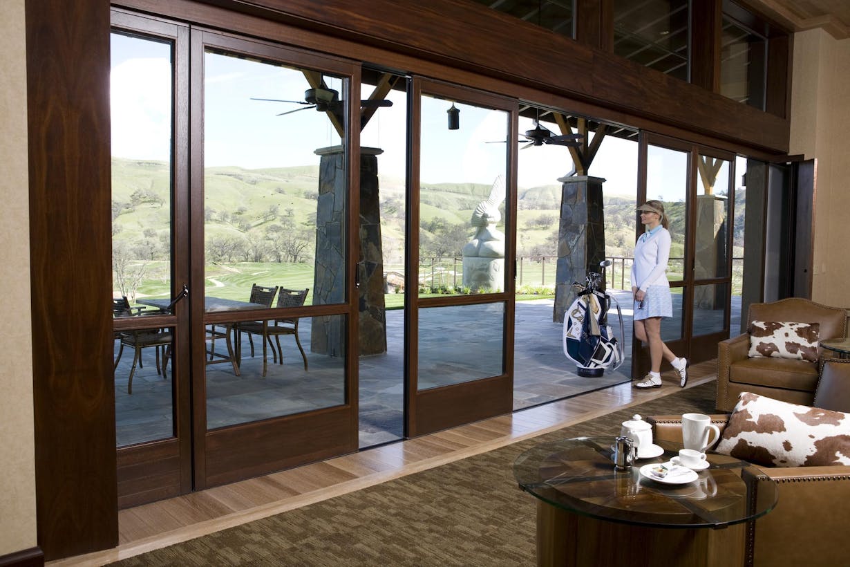 Wood framed sliding glass doors at Cache Creek Country Club in California