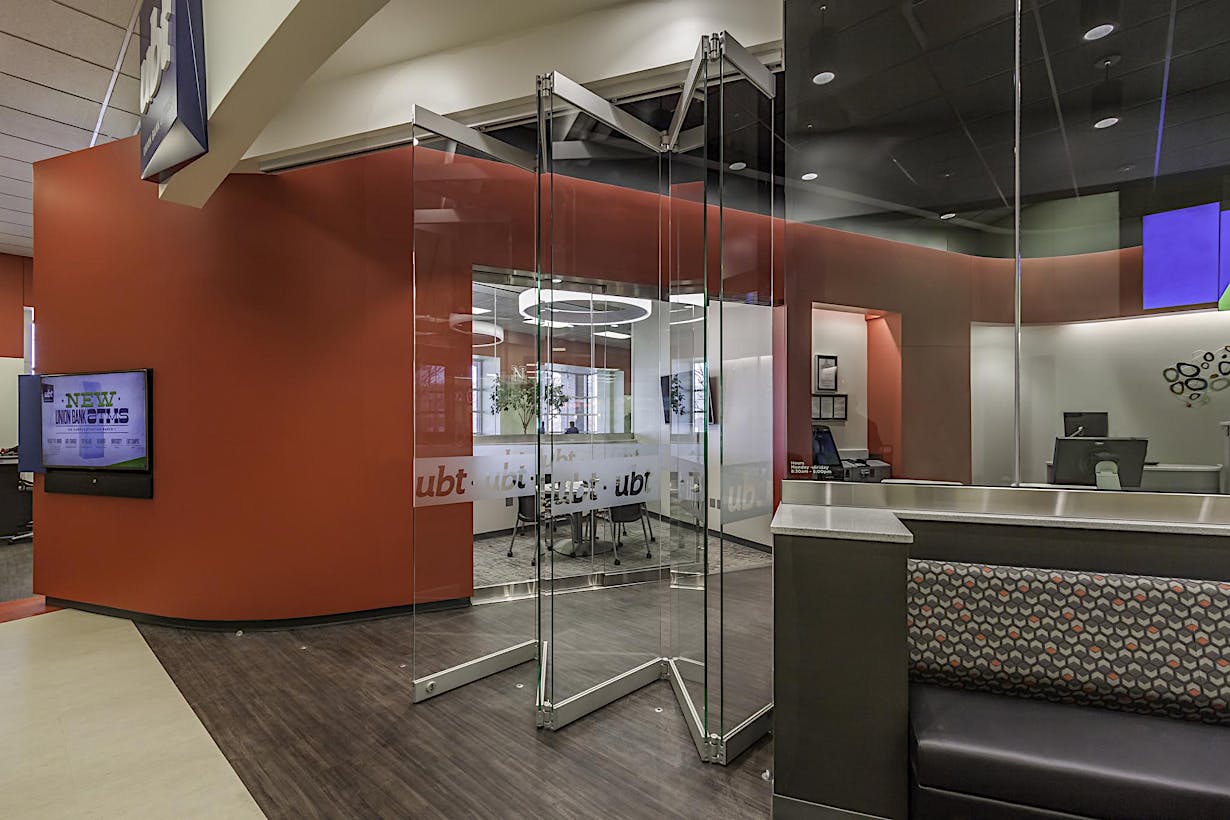 The reception area of a Union Bank with all glass partitions