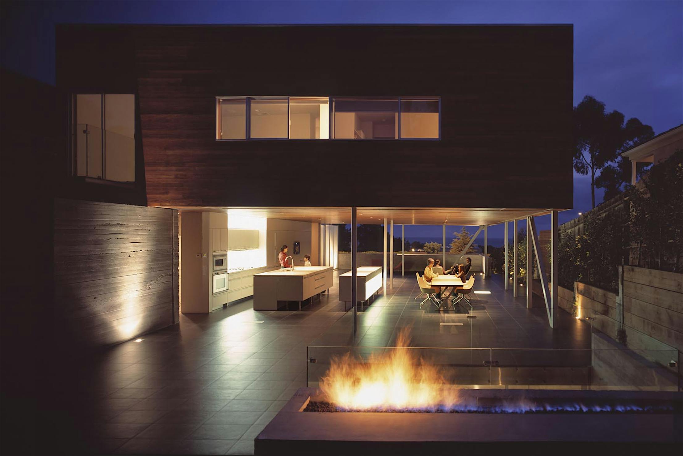 Dining room kitchen with a deck with a fire pit - sliding