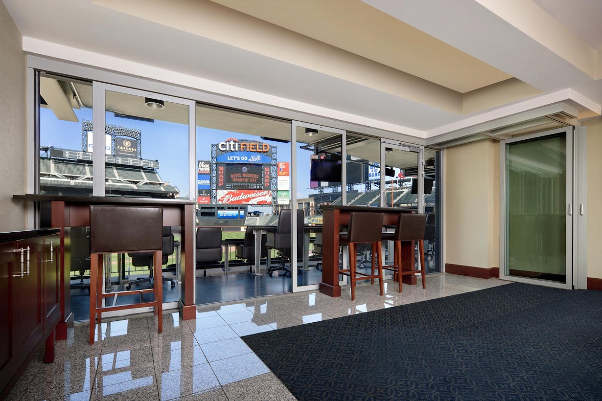 NY Mets Stadium Citi Field lounge with movable glass walls 