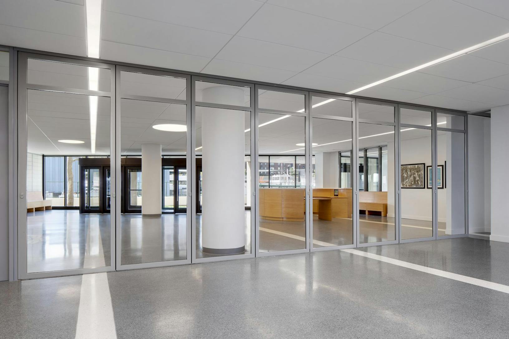 Commercial segmented curved sliding glass walls at The Union Nations International School in NY